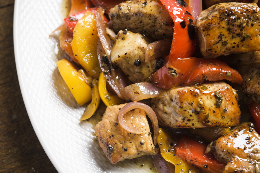 A recipe for pork with sweet peppers, sage and honey.