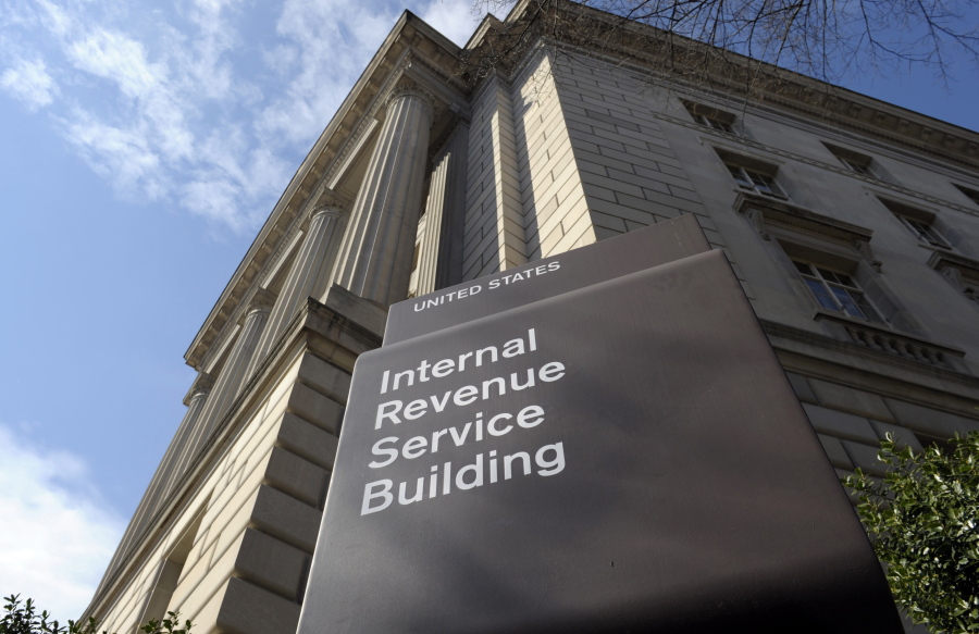 FILE - In this photo March 22, 2013 file photo, the exterior of the Internal Revenue Service (IRS) building in Washington. A complaint filed with the IRS alleges that a conservative group is violating its nonpartisan and nonprofit status by using a voter data system linked to the Republican party. The complaint is against the American Legislative Exchange Council.