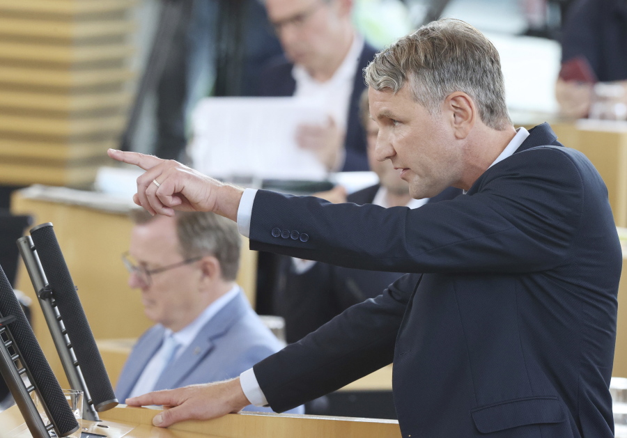 Bjoern Hoecke, parliamentary group leader of the AfD in the Thuringian state parliament, speaks before the vote in the plenary hall in Erfurt, Germany, July 23, 2021.  The far-right Alternative for Germany party failed in an attempt Friday to unseat the left-wing governor of an eastern German state, a long-shot bid that opponents denounced as political theater.