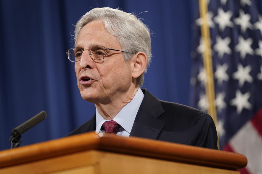 FILE - In this June 25, 2021 file photo, Attorney General Merrick Garland speaks during a news conference at the Department of Justice in Washington. The Justice Department is launching gun strike forces in five cities in the U.S. It is part of an effort to reduce spiking violent crime by addressing illegal trafficking and prosecuting offenses that help put guns in the hands of criminals.
