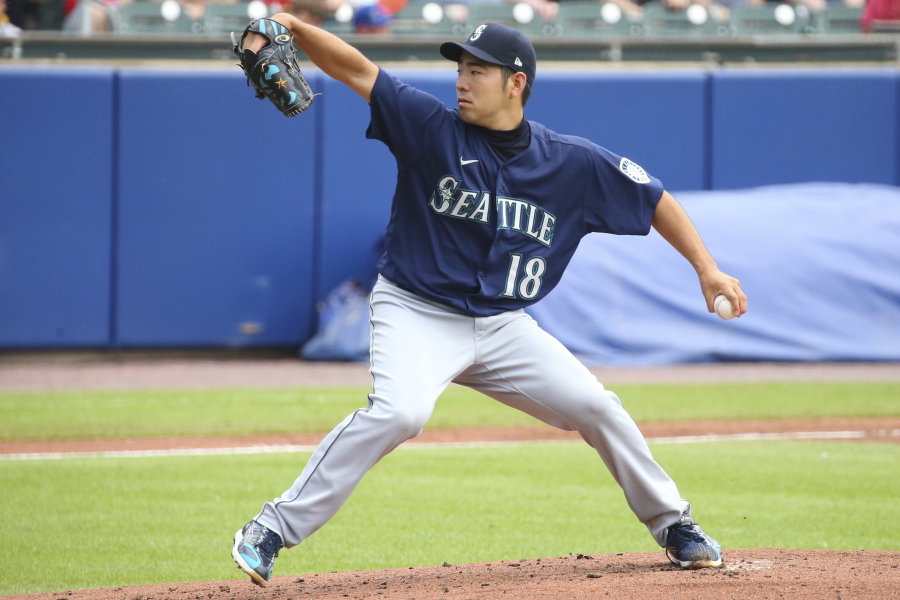 Seattle Mariners starting pitcher Yusei Kikuchi throws to the Toronto Blue Jays during the first inning. (Jeffrey T.