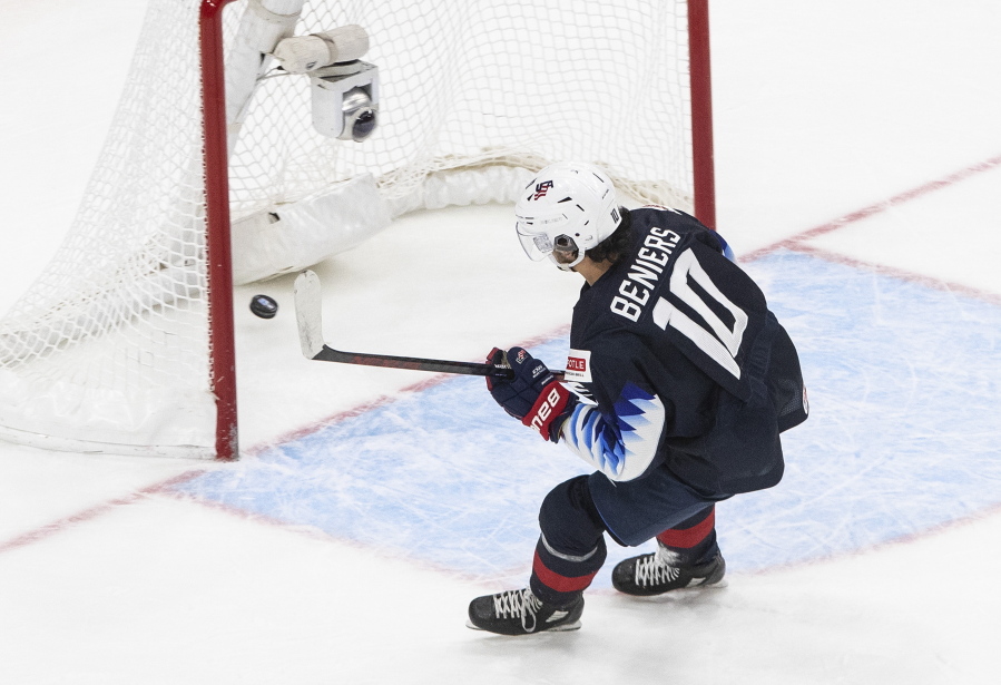 Playing for the United States, Matthew Beniers (10) scores an empty net goal against Slovakia during the World Junior Hockey championship game in Jan. 2, 2021. He became the Seattle Kraken's first-ever draft pick, going No. 2 overall on Friday, July 23, 2021.