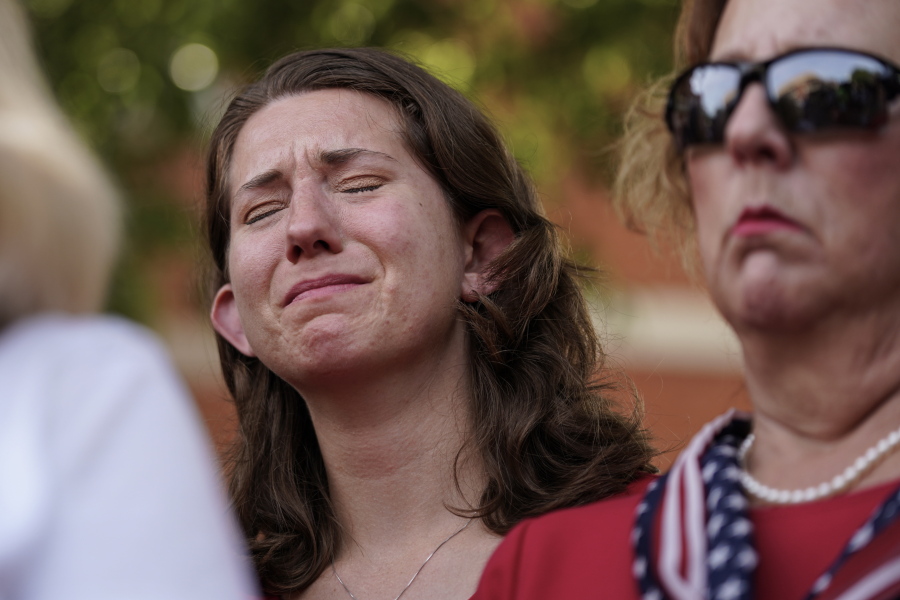 Montana Geimer, daughter of Wendi Winters, a community beat reporter who died in the Capital Gazette newsroom shooting, reacts during a press conference following a verdict in the trial of Jarrod W. Ramos, Thursday, July 15, 2021, in Annapolis, Md. The jury found the gunman who killed five people at the newspaper criminally responsible, rejecting defense attorneys' mental illness arguments.