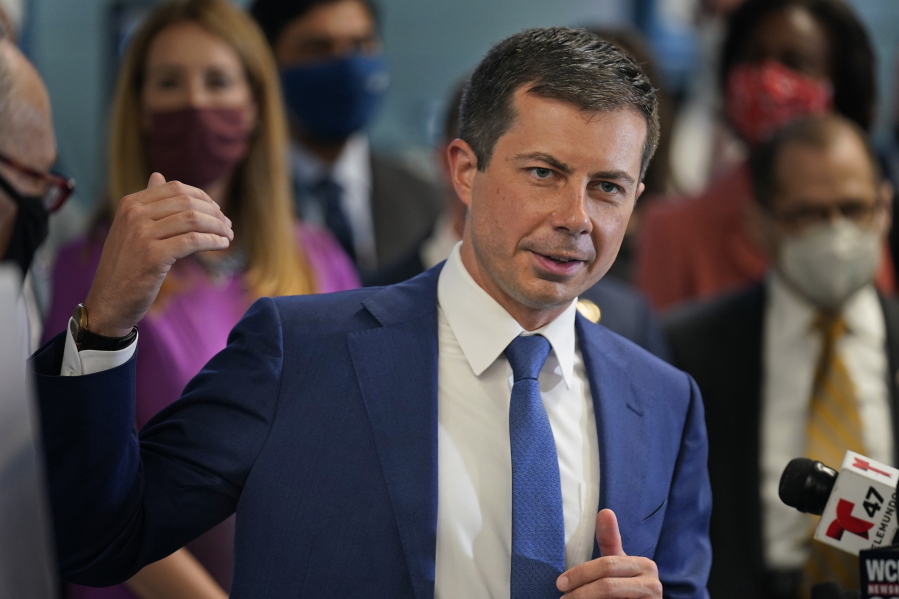 Secretary of Transportation Pete Buttigieg speaks during a news conference in New York, Monday, June 28, 2021. Buttigieg toured the century-old rail tunnel connecting New York and New Jersey as a long-delayed project to build a new tunnel gains steam.