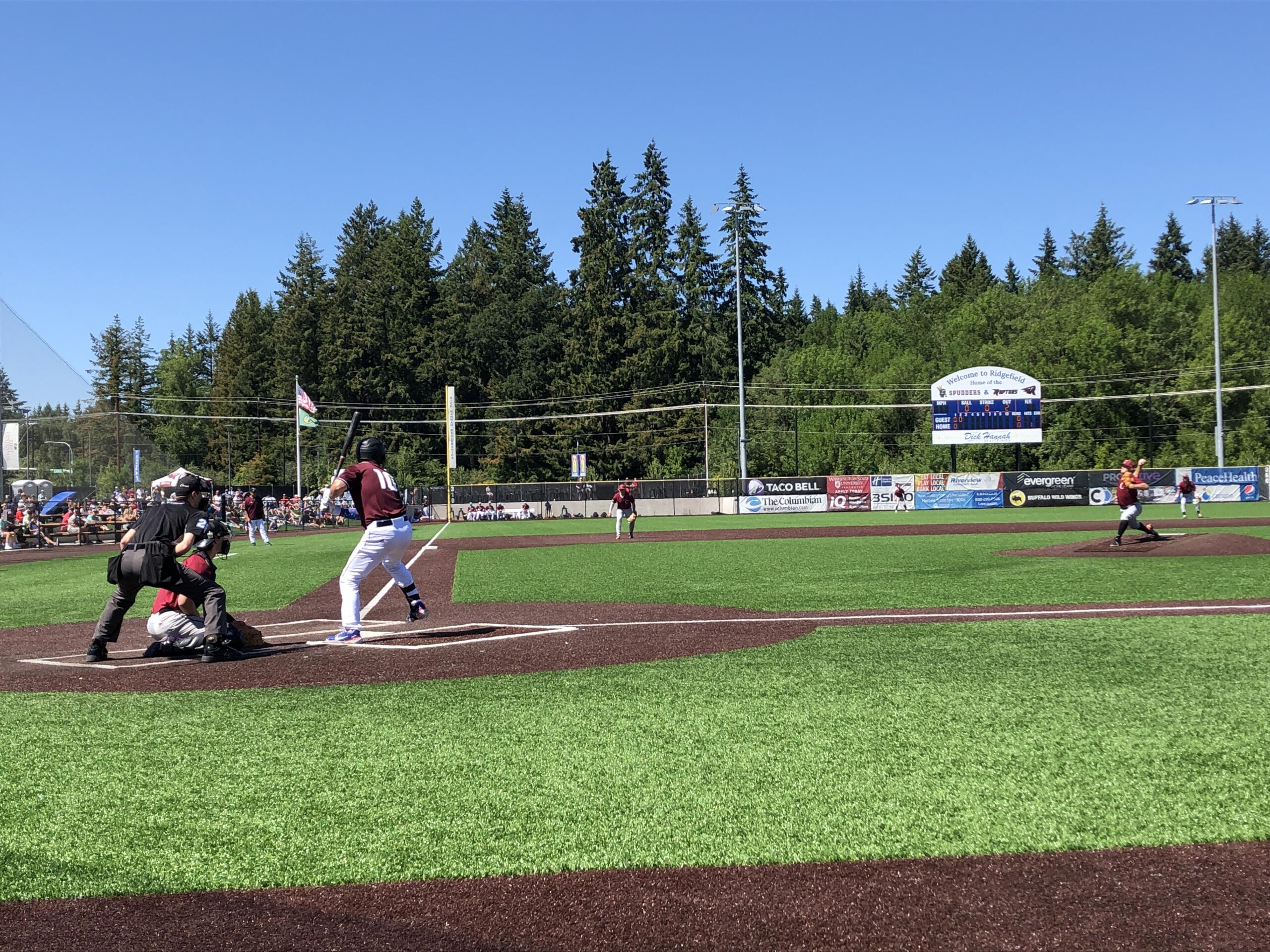 Ridgefield Raptors first baseman Dominic Enbody awaits a pitch from Corvallis right-hander Brock Townsend on Sunday at Ridgefield Outdoor Recreation Complex.