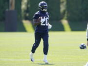 Seattle Seahawks running back Rashaad Penny carries the ball during NFL football practice Thursday, July 29, 2021, in Renton, Wash. (AP Photo/Ted S. Warren) (Ted S.