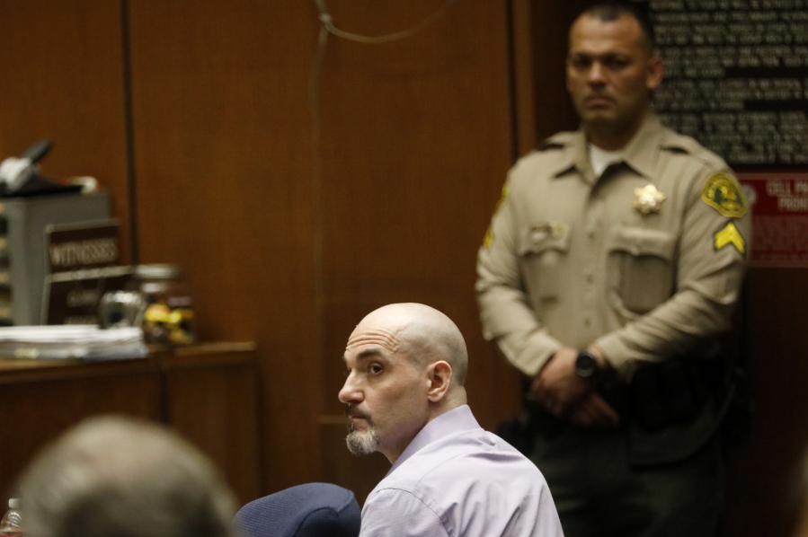 FILE - In this May 29, 2019, file photo, Michael Gargiulo listens to the testimony of actor Ashton Kutcher during Gargiulo's murder trial at Los Angeles Superior Court. Gargiulo has pleaded not guilty to two counts of murder and an attempted-murder charge stemming from attacks in the Los Angeles area between 2001 and 2008, including the death of Kutcher's former girlfriend, 22-year-old Ashley Ellerin. A judge is expected to give a death sentence Friday, Feb. 28, 2020.