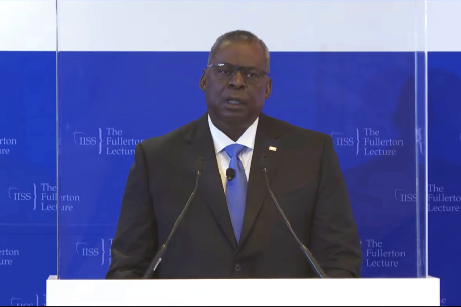 In this image from video provided by IISS, U.S. Defense Secretary Lloyd J. Austin delivers a speech during the 40th IISS Fullerton Lecture Tuesday, July 27, 2021 in Singapore. Austin decried the actions of Myanmar's military rulers as unacceptable on Tuesday, while urging a regional bloc to keep demanding an end to violence. Austin also applauded the Association of Southeast Asian nations for its efforts on the issue, which included forging a consensus with Myanmar's military leader in April.