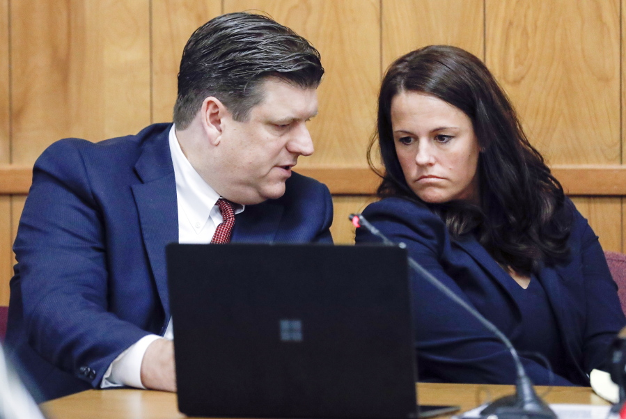 Defense attorneys Chad Frese and Jennifer Frese confer during a hearing for their client Cristhian Bahena Rivera at the Poweshiek County Courthouse in Montezuma, Iowa, on Thursday, July 15, 2021. Bahena Rivera was convicted of killing University of Iowa student Mollie Tibbetts in 2018. A judge delayed Bahena Rivera's sentencing after defense attorneys asserted authorities withheld information about investigations into a nearby sex trafficking ring the lawyers say could have been involved in the fatal stabbing.