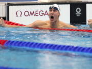 Chase Kalisz, of the United States, celebrates winning the final of the men's 400-meter individual medley at the 2020 Summer Olympics, Sunday, July 25, 2021, in Tokyo, Japan.
