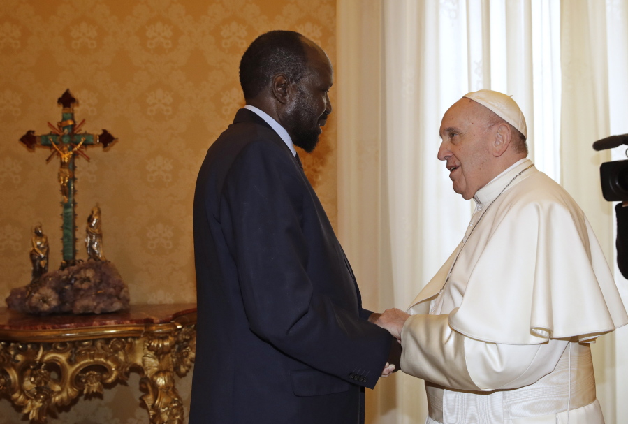 FILE - In this March 16, 2019 file photo, South Sudan President Salva Kiir Mayardit meets Pope Francis during their private audience at the Vatican. Pope Francis and the Archbishop of Canterbury marked the 10th anniversary of the independence of South Sudan on Friday, July 9, 2021, by urging its rival political leaders to make the necessary personal sacrifices to consolidate peace.