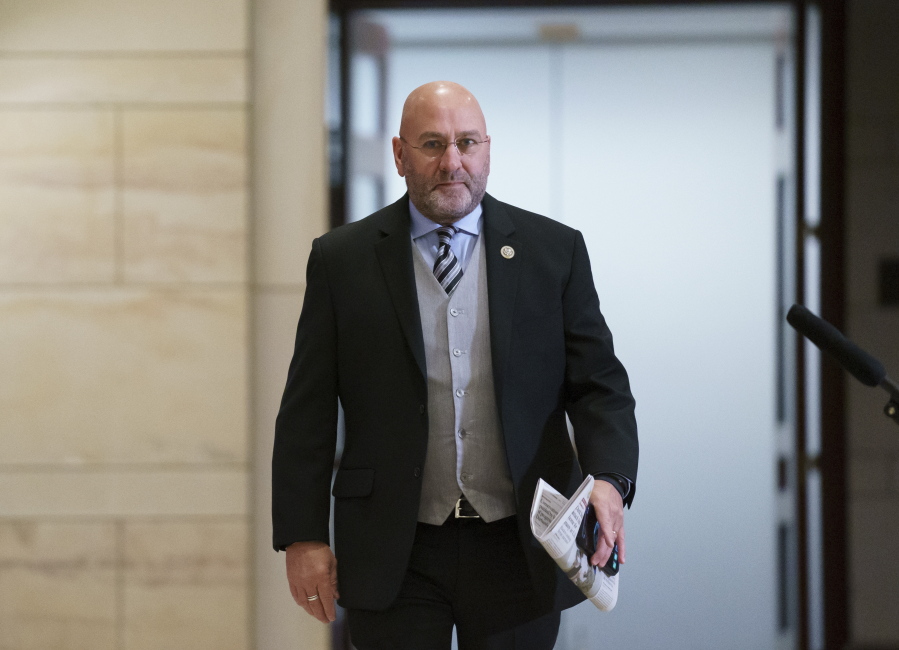 FILE - Rep. Clay Higgins, R-La., arrives at the Capitol in Washington, Friday, May 14, 2021. Higgins, who represents southwest Louisiana, said he, his wife and son have contracted the coronavirus. Higgins made the announcement Sunday, July 25, 2021 on his Facebook page. The Republican representative said he and his wife previously contracted the virus in 2020 but said this time around was much more difficult. (AP Photo/J.