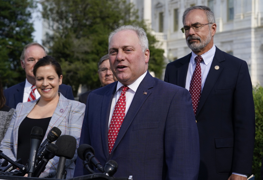 House Minority Whip Steve Scalise, R-La., joined by House Republican Conference Chair Elise Stefanik, R-N.Y., left, and members of the GOP Doctors Caucus, speaks during a news conference about the Delta variant of COVID-19 and the origin of the virus, at the Capitol in Washington, Thursday, July 22, 2021. (AP Photo/J.