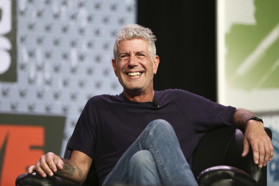 FILE - In this Sunday, March 13, 2016, file photo Anthony Bourdain speaks during South By Southwest at the Austin Convention Center, in Austin, Texas. The revelation that a documentary filmmaker used voice-cloning software to make the late chef Bourdain say words he never spoke has drawn criticism amid ethical concerns about use of the powerful technology. The movie "Roadrunner: A Film About Anthony Bourdain" appeared in cinemas Friday, July 16, 2021, and mostly features real footage of the beloved celebrity chef and globe-trotting television host before he died in 2018.
