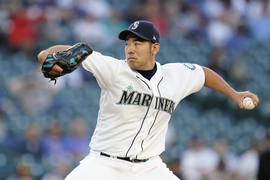 Seattle Mariners starting pitcher Yusei Kikuchi throws to a New York Yankees batter during the second inning of a baseball game Wednesday, July 7, 2021, in Seattle.