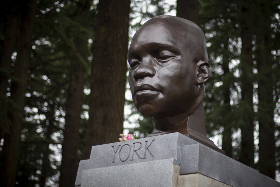 FILE - In this Sunday Feb. 21, 2021, file photo, the bust of York is seen on Mount Tabor in southeast Portland, Ore. Officials say the bust of York, commemorating an enslaved Black member of the Lewis and Clark Expedition was toppled and damaged. A Portland Parks and Recreation spokesperson told KOIN 6 News that the bust of York was torn from its pedestal and significantly damaged Tuesday night, July 27, or early Wednesday.
