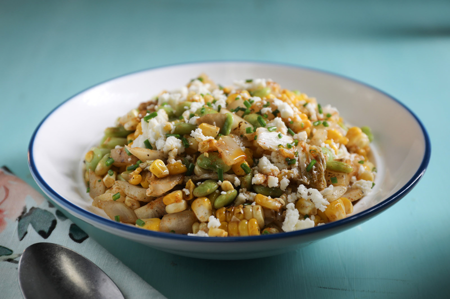Corn and edamame succotash salad, toped with quest fresco, prepared and style by Shannon Kinsella.