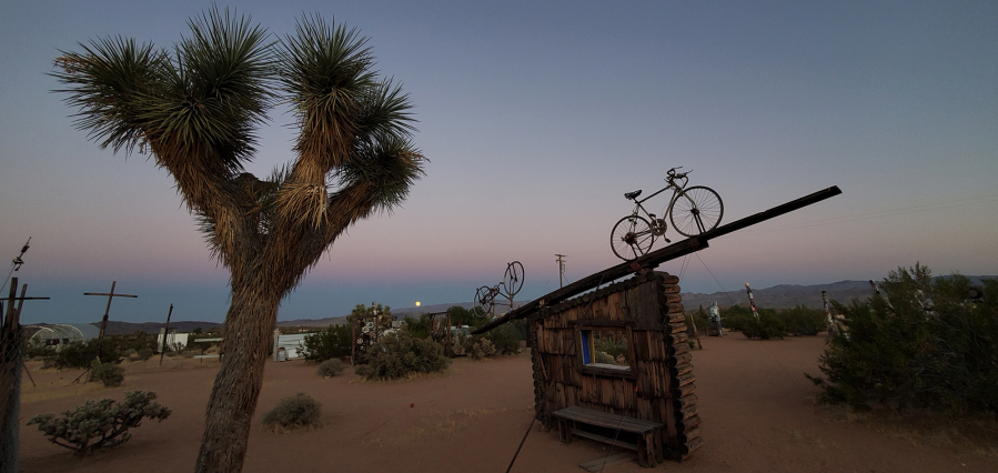 A bicycle appears ready to ride into the sunset at the Noah Purifoy Desert Art Museum of Assemblage Art, a 10-acre installation the late L.A. artist created in Joshua Tree.