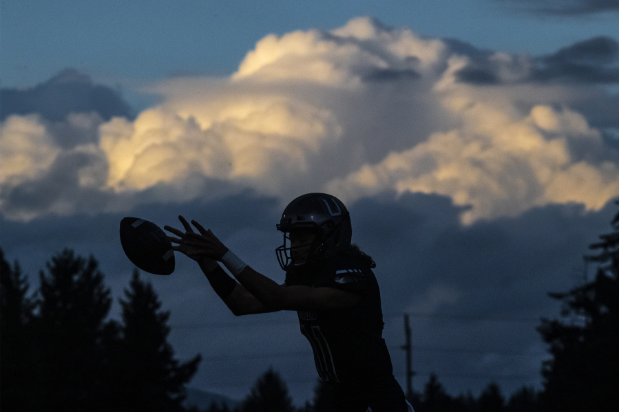 Union quarterback Alex Gehrmann catches the ball in a game against Chiawana at McKenzie Stadium on Friday night, Sept 27, 2019.