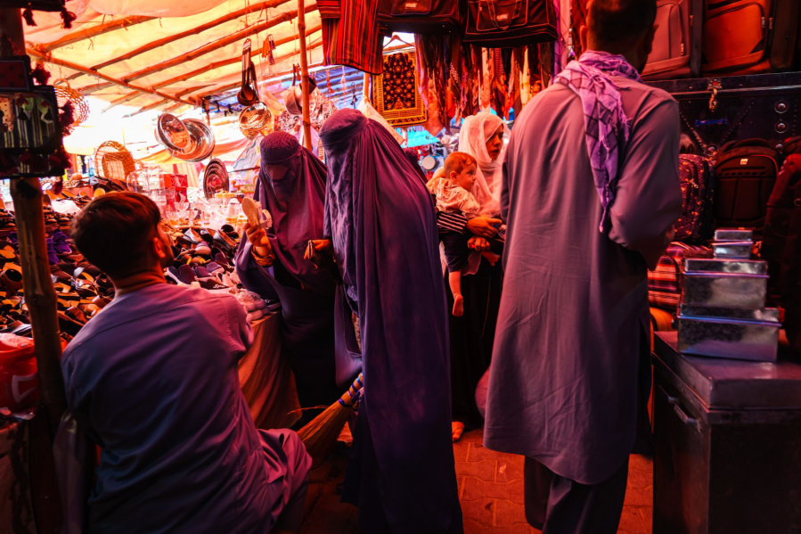 Women shop in the women's area of the Lycee Maryam Bazaar in the Khair Khana neighborhood in Kabul, Afghanistan, Sunday, Aug. 22, 2021.