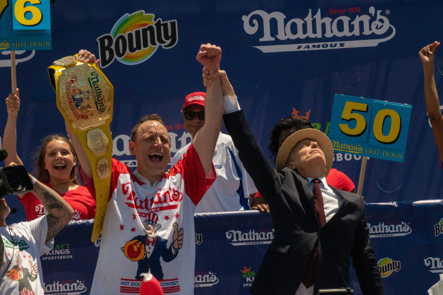 Competitive eating champion Joey "Jaws" Chestnut wins the 2021 Nathan's Famous 4th of July International Hot Dog Eating Contest with 76 hot dogs, breaking his personal best record of 75 at Coney Island on July 4 in New York City.