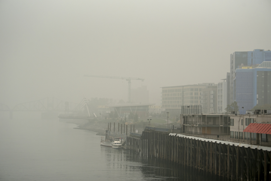 The Grant Street Pier is barely visible as thick wildfire smoke blankets Vancouver, as seen from the Interstate Bridge on Sept. 14, 2020.