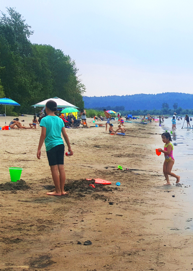 The relatively shallow water near the shores of Cottonwood Beach on the Columbia River offers fun summertime splashing. Even when it's crowded, you can find your spot.