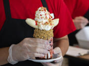 The Old School Banana Split is served up to a customer at The Yard.