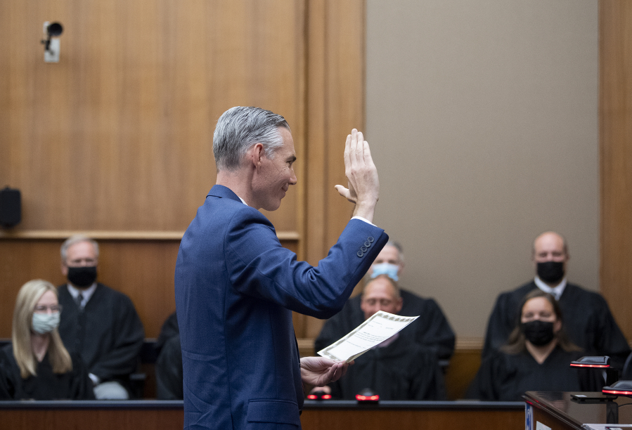 Judge James Smith is sworn into District Court at the Clark County Courthouse on Tuesday afternoon. Smith will have to run for election in 2022 to keep the seat.