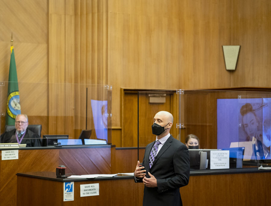 Senior Deputy Prosecutor Colin Hayes gives an opening statement to the jury at the murder trial of David Bogdanov on Tuesday morning at the Clark County Courthouse. Bogdanov is accused of strangling 17-year-old Nikki Kuhnhausen, a transgender teen.