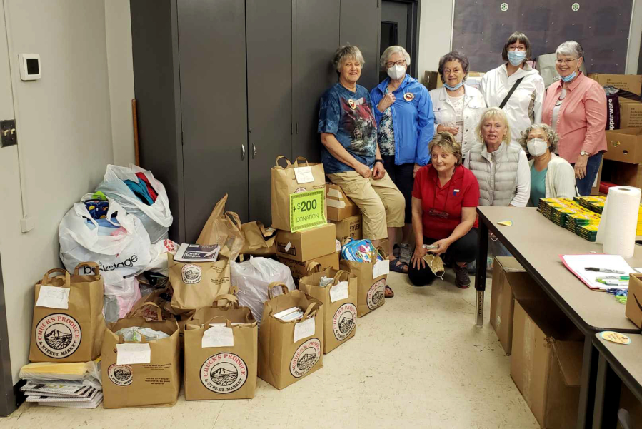Boxes and bags of school supplies were taken to the Battle Ground Education Foundation office on the district's Lewisville campus by Greater Federation of Women's Club-Battle Ground members. Standing are: Ginger Crabtree, president Mary Lee Miller, Nancy Lee, Johanna Hyatt and Linda Tochen. In front are Marla Polos, Paulette Stinson and Valerie Huey. Not pictured was Cindi Pike, member photographer.