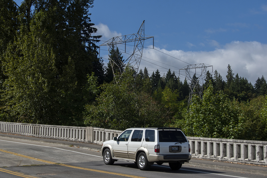 Power transmission lines and towers that run east through Vancouver are pictured above Burnt Bridge Creek on Monday morning. A balloon hit one of the lines near this spot on Aug. 21 and caused a brief power outage for nearly 19,000 people.