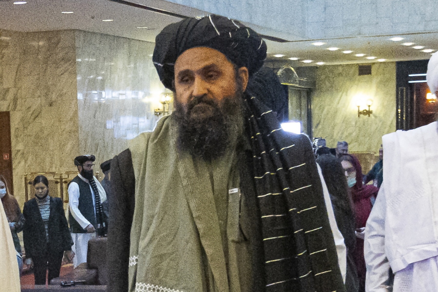 FILE - In this March 18, 2021, file photo, Taliban co-founder Mullah Abdul Ghani Baradar, arrives with other members of the Taliban delegation for an international peace conference in Moscow, Russia. Baradar's biography charts the Taliban's long journey from a pious but brutal Islamic militia to an insurgency that battled the U.S. for two decades, ultimately returning to power through pragmatic diplomacy and military might. His experience also sheds light on the Taliban's complicated relationship with neighboring Pakistan.