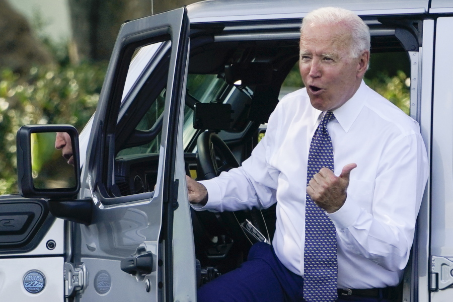 President Joe Biden talks after driving Jeep Wrangler 4xe Rubicon on the South Lawn of the White House in Washington, Thursday, Aug. 5, 2021, during an event on clean cars and trucks.