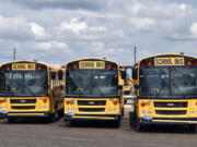School buses parked in Helena, Mont., ahead of the beginning of the school year, Friday, Aug. 20, 2021. School districts across the country are coping with a shortage of bus drivers, a dilemma that comes even as they struggle to start a new school year during a new surge of the coronavirus pandemic.