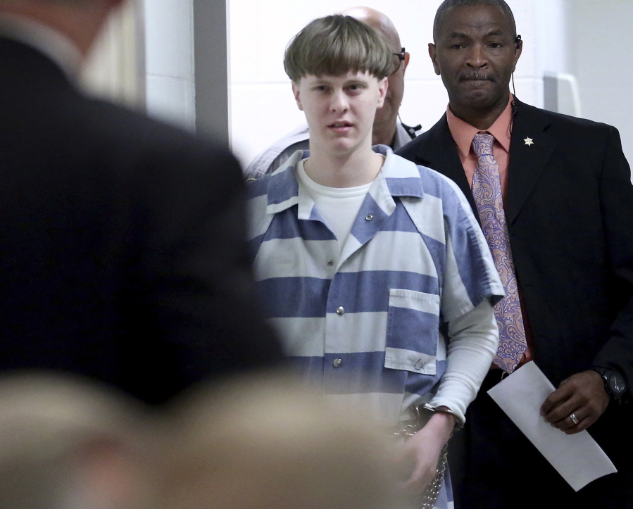 FILE - In this April 10, 2017, file photo, Dylann Roof enters the court room at the Charleston County Judicial Center to enter his guilty plea on murder charges in Charleston, S.C. A federal appeals court on Wednesday, Aug. 25, 2021, upheld Roof's conviction and sentence on federal death row for the 2015 racist slayings of nine members of a Black South Carolina congregation. A three-judge panel of the 4th U.S. Circuit Court of Appeals in Richmond affirmed Roof's conviction and sentence in the shootings at Mother Emanuel AME Church in Charleston.