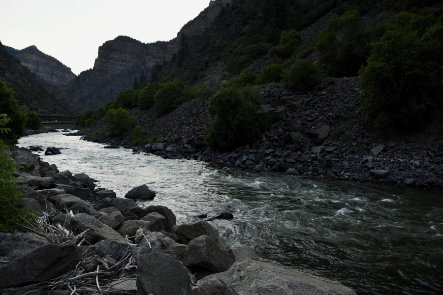 The Colorado River flows near Grizzly Creek Rest Area in Glenwood Canyon on Thursday, Aug. 22, 2019, in Glenwood Springs, Colo. The U.S. Department of Energy on Tuesday, Aug. 24, 2021, announced a new kind of climate observatory near the headwaters of the Colorado River that will help scientists better predict rain and snowfall in the U.S. West and determine how much of it will flow through the region.