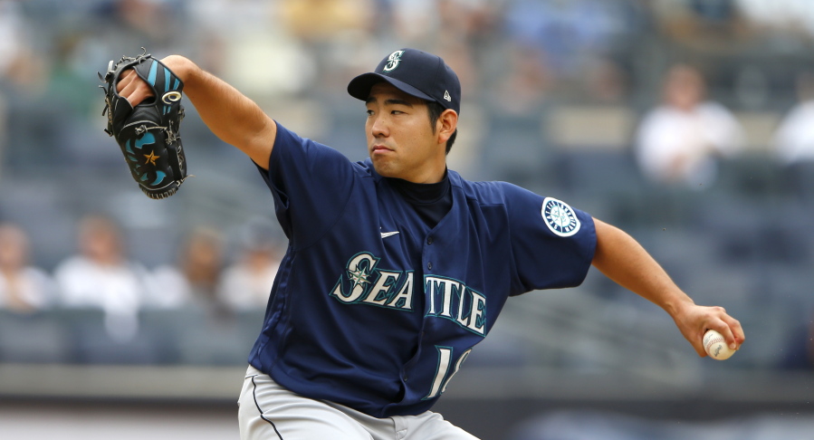 Seattle Mariners starting pitcher Yusei Kikuchi (18) throws against the New York Yankees during the second inning of a baseball game Sunday, Aug. 8, 2021, in New York. (AP Photo/Noah K.