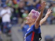 OL Reign forward Megan Rapinoe (15) celebrates after she scored a goal against the Portland Thorns during the first half of an NWSL soccer match, Sunday, Aug. 29, 2021, in Seattle. (AP Photo/Ted S.