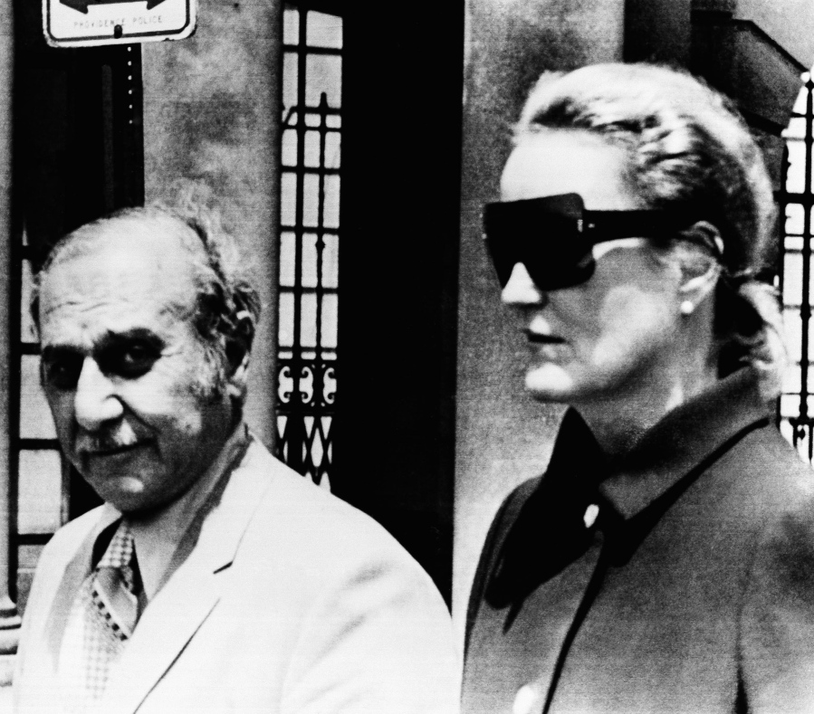 FILE - In this June 17, 1971 file photo, heiress Doris Duke and her attorney Aram Arabian, leave Superior Court in Providence, R.I. When Duke, the fabulously wealthy tobacco and power company heir, ran over and killed a longtime employee and confidant at her Newport, R.I. mansion in 1966, many people never bought the official police report that the death was an "unfortunate accident." Peter Lance's book "Homicide at Rough Point" released earlier this year concluded that Duke literally got away with murder in the death of Eduardo Tirella.