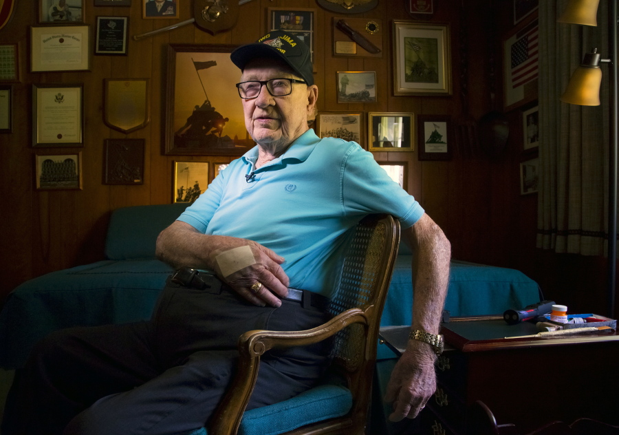 Dave Severance, a retired U.S. Marine colonel whose troops were the first to plant an American flag over the Japanese island of Iwo Jima during World War II, is seen at his home in San Diego on May 20, 2015. Severance, 102, died Monday, Aug. 2, 2021, at his home in the San Diego suburb of La Jolla, according to the San Diego Union-Tribune.  (Nelvin C.
