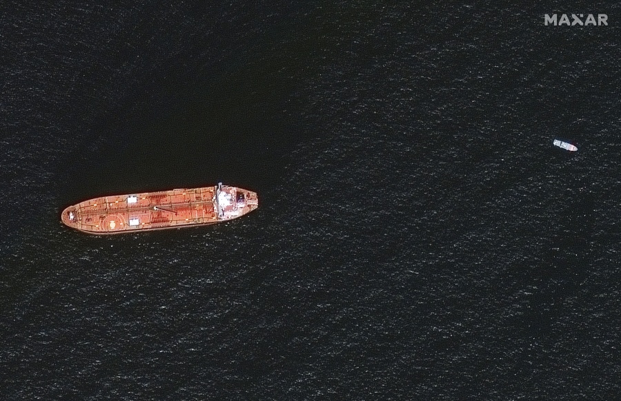 In this image provided by Maxar Technologies, the oil tanker Mercer Street is seen off the coast of Fujairah, United Arab Emirates, Wednesday Aug. 4, 2021. The United States, United Kingdom and Israel blame Iran for an attack on the Mercer Street off Oman that killed two people amid tensions over Tehran's tattered nuclear deal with world powers. Iran has denied being involved.