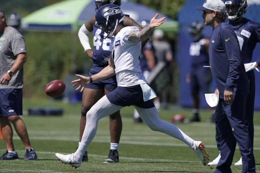 Seattle Seahawks punter Michael Dickson kicks during NFL football practice Thursday, July 29, 2021, in Renton, Wash. (AP Photo/Ted S.