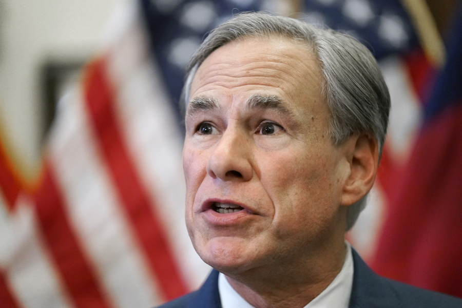 FILE - In this June 8, 2021, file photo, Texas Gov. Greg Abbott speaks at a news conference in Austin, Texas. Abbott tested positive for COVID-19 on Tuesday, Aug. 17, 2021, according to his office, who said he is in good health and experiencing no symptoms. Abbott, who was vaccinated in 2020, was isolating in the governor's mansion in Austin and receiving monoclonal antibody treatment, spokesman Mark Miner said in a statement.