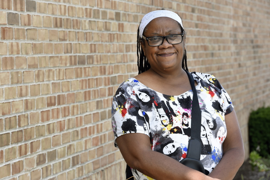 Regina Howard poses for a photo in Southfield, Mich., Friday, July 30, 2021. Lakeshore Legal Aid successfully helped Howard receive $24,550 in federal funds to pay for 15 months of rent.