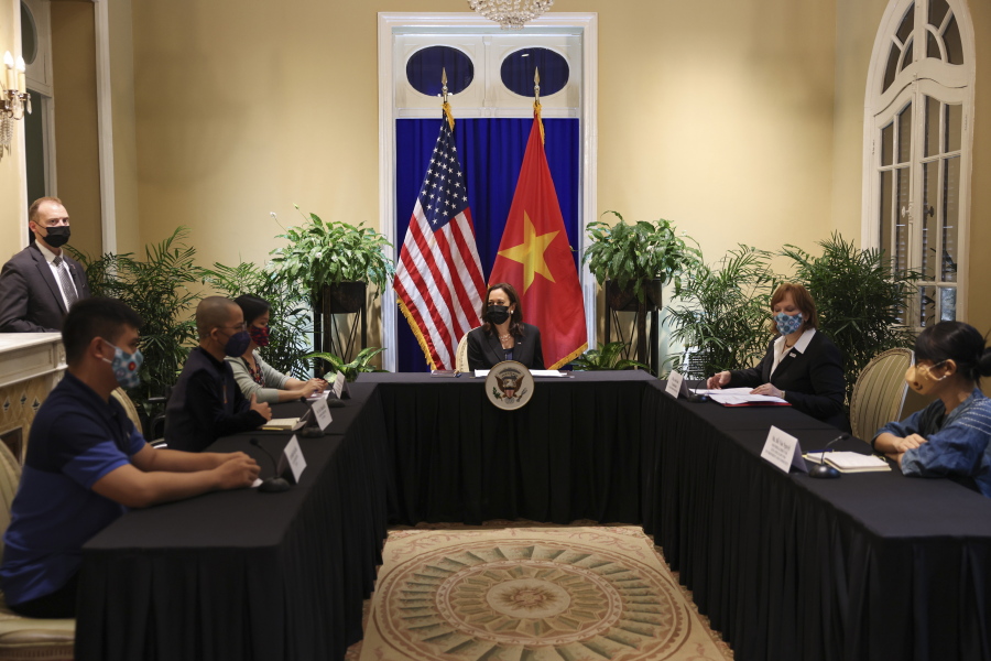 U.S. Vice President Kamala Harris meets with activists who work on LGBT, transgender, disability rights and climate change at the U.S. Chief of Mission's residence in Hanoi, Vietnam, Thursday, Aug. 26, 2021.