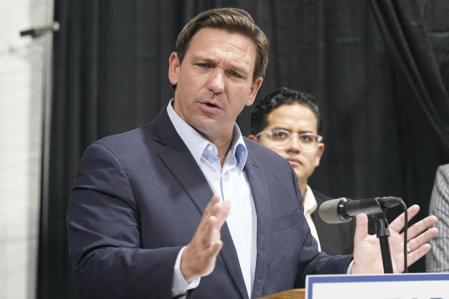 Florida Governor Ron DeSantis speaks at the opening of a monoclonal antibody site Wednesday, Aug. 18, 2021, in Pembroke Pines, Fla. The site at C. B. Smith Park will offer monoclonal antibody treatment sold by Regeneron to people who have tested positive for COVID-19.
