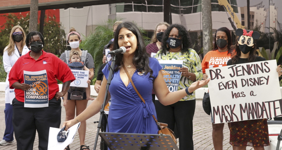 State Rep. Anna Eskamani, D-Orlando, delivers remarks at a protest in front of the Orange County Public Schools headquarters in downtown Orlando, Fla., Monday, Aug. 23, 2021. Teachers, parents and union representatives gathered to demand that the Orange school board adopt a mandatory mask policy because of rising COVID-19 cases, despite an executive order banning school mandates from Florida Gov. Ron DeSantis.