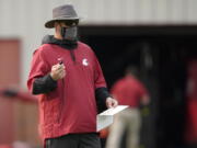 Washington State head coach Nick Rolovich would like for attention going into the 2021 season to be focused on players on the field, but he is getting just as much attention around his decision not to receive a COVID-19 vaccination. (AP Photo/Ted S.