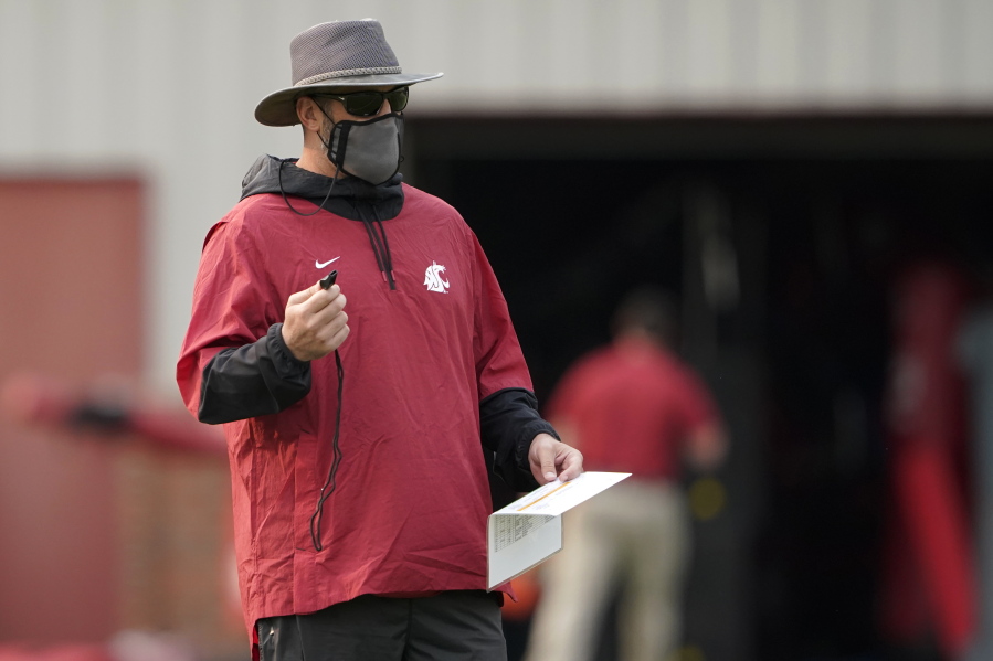Washington State head coach Nick Rolovich would like for attention going into the 2021 season to be focused on players on the field, but he is getting just as much attention around his decision not to receive a COVID-19 vaccination. (AP Photo/Ted S.